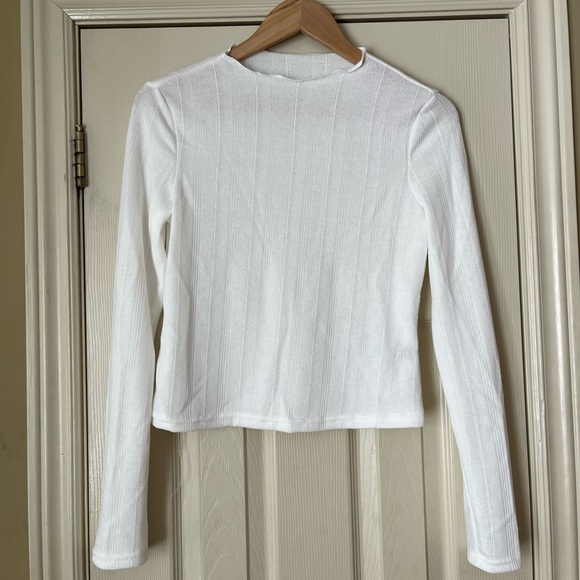 Shein long sleeve white top, cropped with lettuce trim around the neck. - Picture 1 of 1